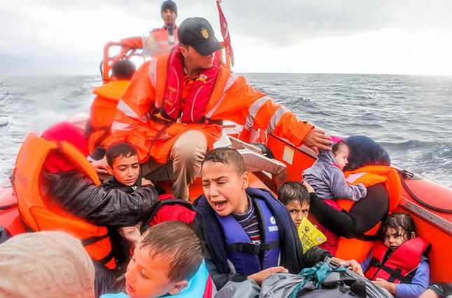 A stark reminder of what's wrong with the world -- and questioning why we would 'build more walls.' Syrian children rescued in the Aegean Sea off Turkey while trying to get to Greece in 2015. Photo: UGUR YILDIRIM/SABAH